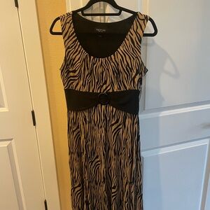 Beautiful black and gold print dress size medium.